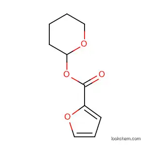 Oxan-2-yl furan-2-carboxylate